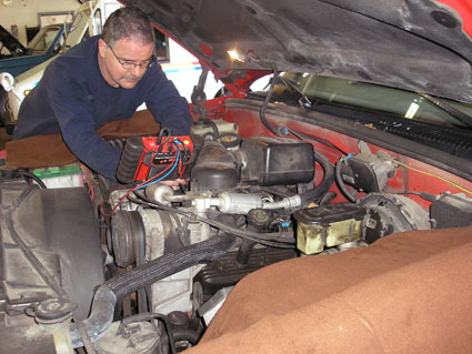 Vehicle service at Mac's Auto